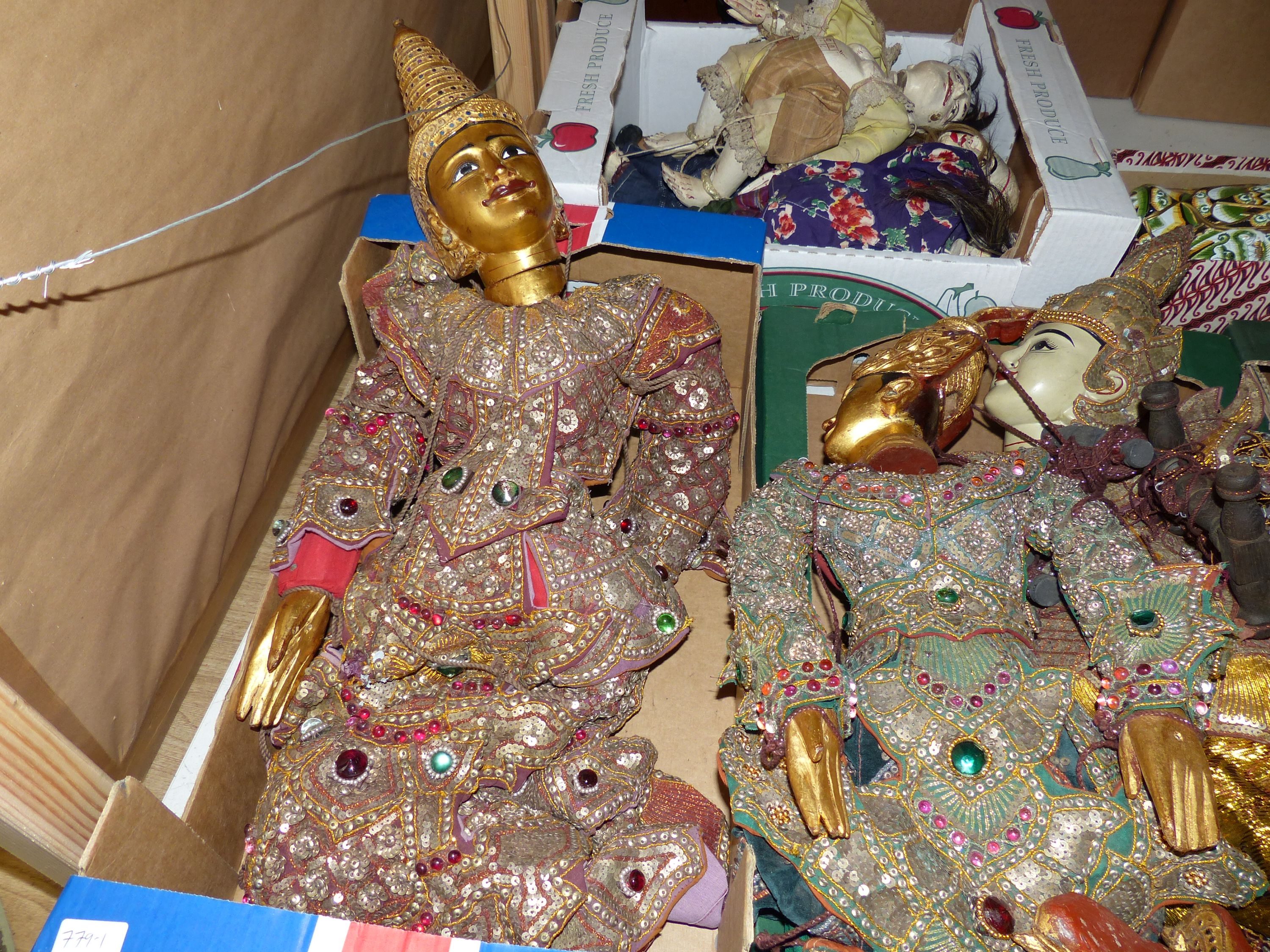 A quantity of Indonesian marionettes